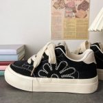 Black Canvas Sneakers with Stitched Flower Design - Image 2